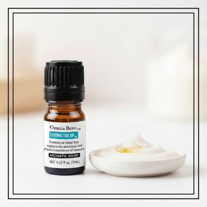 Essential oil bottle labeled 'Omnia Bene' Exiting the OR on a light background with lotion