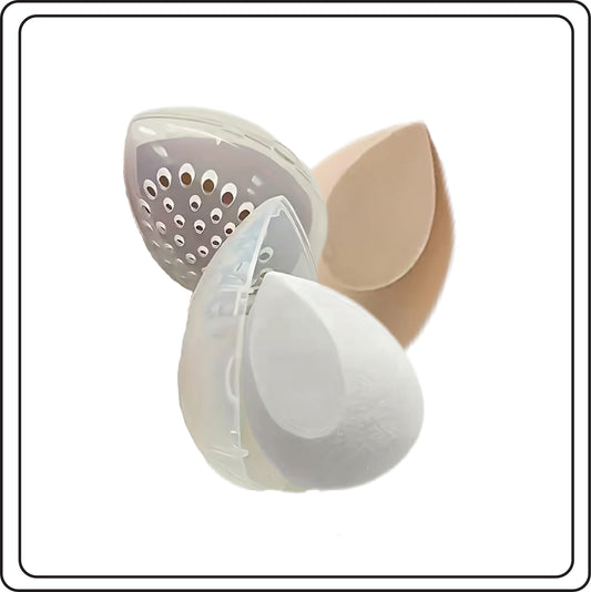 Clear plastic makeup sponge carry cases and makeup sponges on a white background