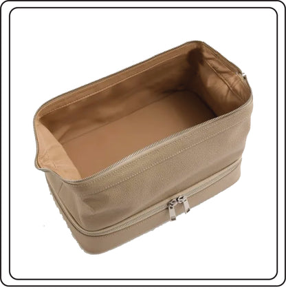 Inside of Puccian beige leather travel bag with a zipper on a white background