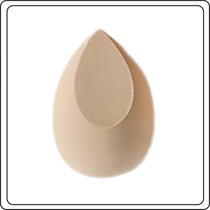 Beige makeup sponge on a white background