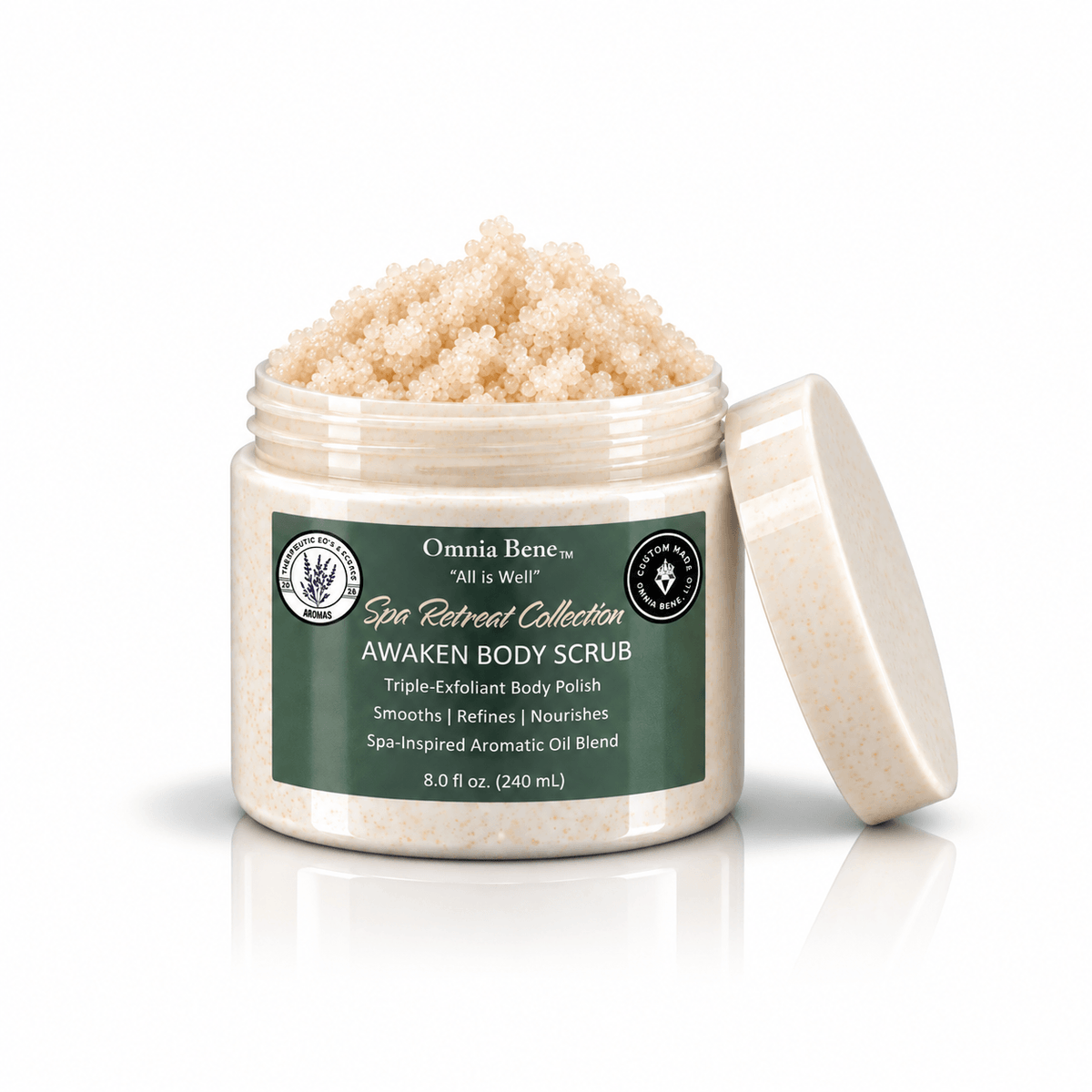 Omnia Bene AWAKEN Body Scrub with the lid off, showing the triple-exfoliant sugar polish heaped above the rim.