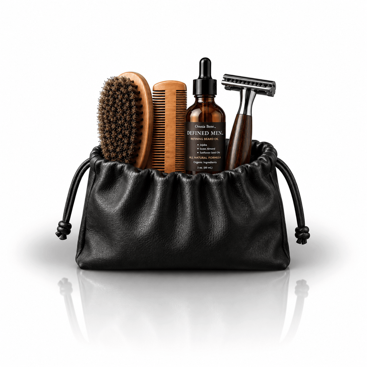 Omnia Bene Defined Men beard manicuring set: brush, comb, beard oil and razor with a black drawstring pouch. The Defined Men beard manicuring set in a black drawstring pouch - brush, comb, beard oil and razor. Everything needed to condition, shape and refine a beard, in one roll.
