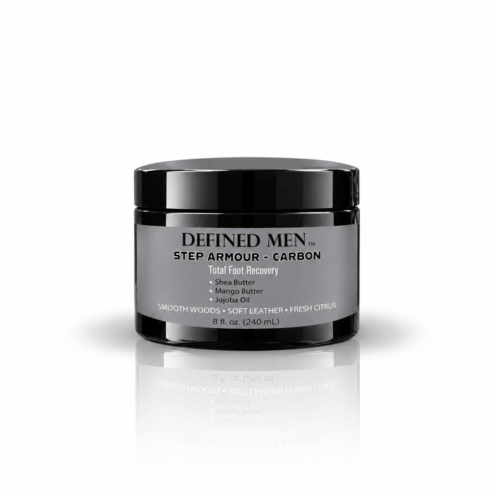 Omnia Bene Defined Men Step Armor foot recovery cream in a black 8 fl oz jar, Carbon scent. Waterless, with organic butters and botanical oils. For cracked heels, hard skin and feet that have been in boots all day. Work it in at night.