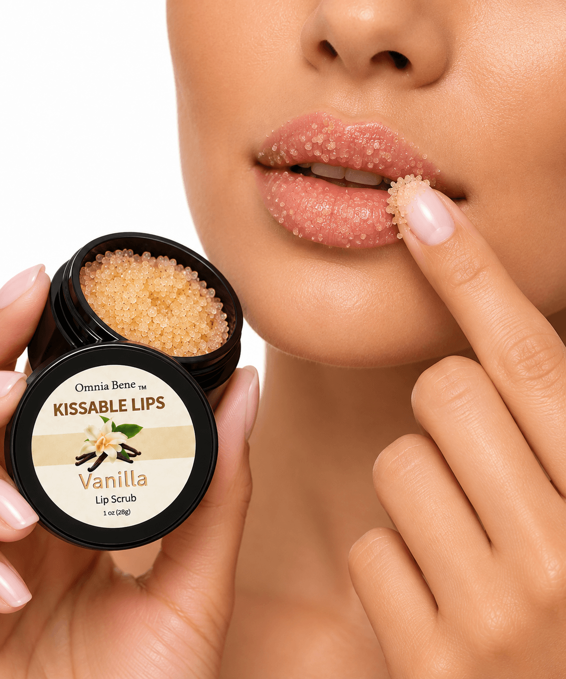 Omnia Bene Kissable Lips Vanilla Lip Scrub being massaged onto the lips, with the open jar held alongside.