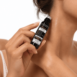 Omnia Bene Puccian KNOCKOUT sleep rollerball being rolled onto the side of the neck.