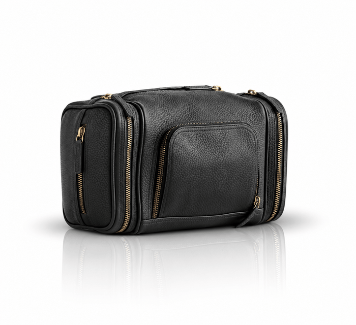 Omnia Bene Puccian Nappa leather travel dopp kit in black with zip pockets and brass hardware.