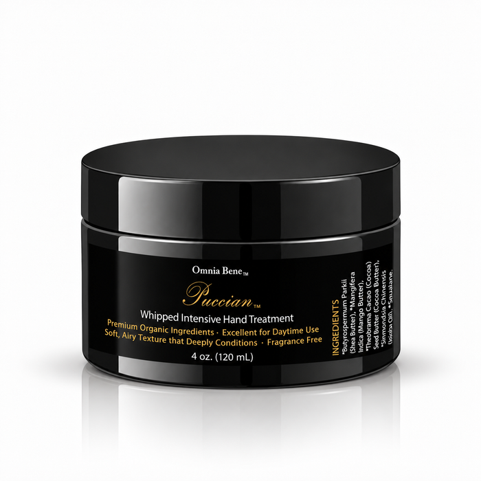 Omnia Bene Puccian Whipped Intensive Hand Treatment in a black 4 oz jar with gold lettering, fragrance free. Whipped organic butters and botanical oils, waterless, that deeply condition dry, rough hands and leave a silky, protective finish with no greasy feel. For daytime use, as often as hands need it.