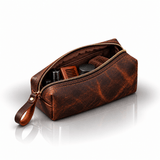 Omnia Bene small Crazy Horse leather toiletry case, unzipped with grooming essentials inside.